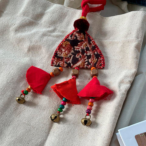 Bell Shaped Bag Accessory with Red Tassels