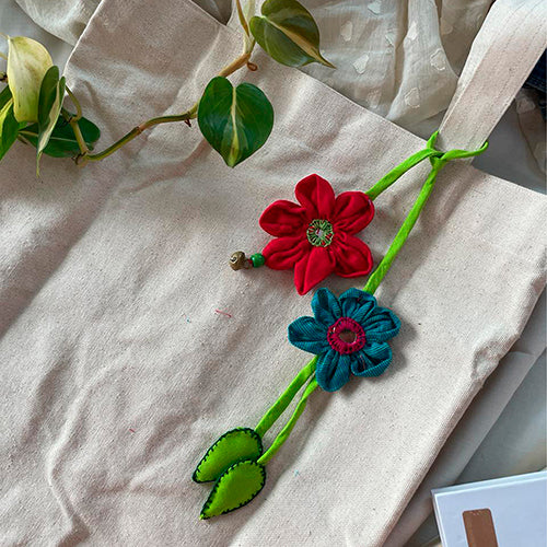 Floral Charm Cotton Fabric Flower And Leaf Bag Accessory with Mirror Work